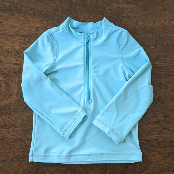 Primary light blue zip rash guard
